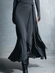 Flowy FJØRNA summer maxi dress for women featuring a wrap design and lightweight fabric, perfect for warm weather.