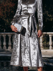 FJØRNA button-front belted midi coat dress for women, stylish long dress with a fitted waist and classic collar, shown on model.