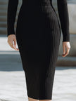 FJØRNA black ribbed knit midi dress with contrast lapel, long sleeves, fitted silhouette, and stylish design for women.