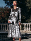 FJØRNA button-front belted midi coat dress for women, featuring a stylish midi-length design with a waist belt and classic button details.