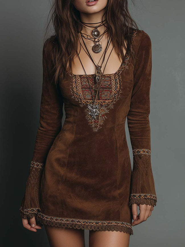 Brown suede embroidered boho mini dress by FJØRNA featuring leather dress look and intricate embroidery details.