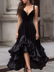 FJØRNA velvet high-low evening gown with layered ruffled hem and long sleeves, elegant maxi dress for formal occasions.