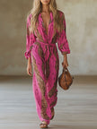 Rose red leopard print chiffon jumpsuit with long sleeves by FJØRNA, featuring a stylish and flowy design.