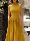 FJØRNA two-way convertible high-neck draped midi dress for women, showcasing its elegant neckline and flowing fabric.