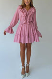 FJØRNA solid color V-neck ruffled ruched long-sleeved vacation mini dress, casual wedding dress style, displayed on a hanger.