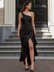 Black FJØRNA one-shoulder satin gown with draped design, featuring a sleek maxi dress silhouette and elegant style.