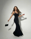 FJØRNA black satin maxi dress for women with elegant slim fit design, perfect for parties and special occasions.