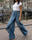 FJØRNA lightweight high-waisted wide-leg wrap summer trousers for women, in a soft celeste color, stylish and comfortable pants.