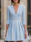 Elegant powder blue pleated fit-and-flare dress by FJØRNA, featuring a flattering silhouette and stylish design for women.