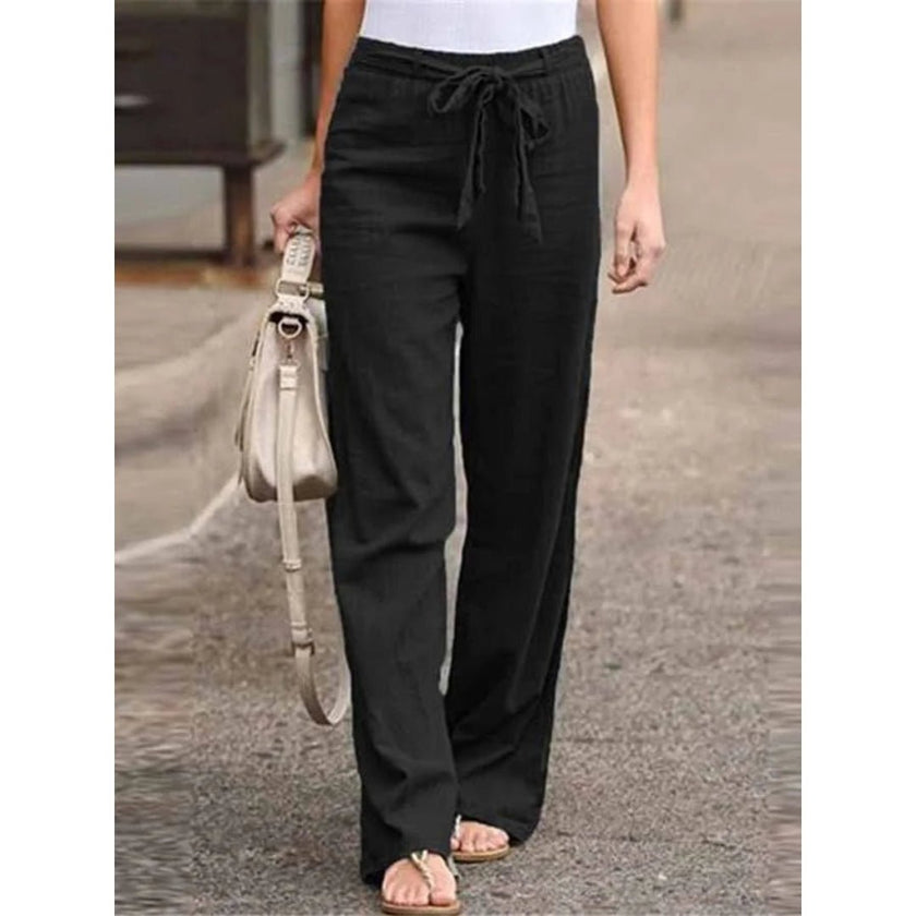 FJØRNA women's lightweight summer trousers with wide leg and drawstring, made from breathable fabric, perfect for warm weather.