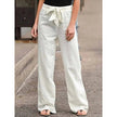 Lightweight FJØRNA women's summer wide-leg drawstring pants with breathable fabric and relaxed fit, shown in natural beige.