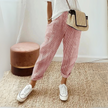 FJØRNA lightweight summer women's wide-leg trousers with breathable fabric and side pockets, featuring a striped pattern.