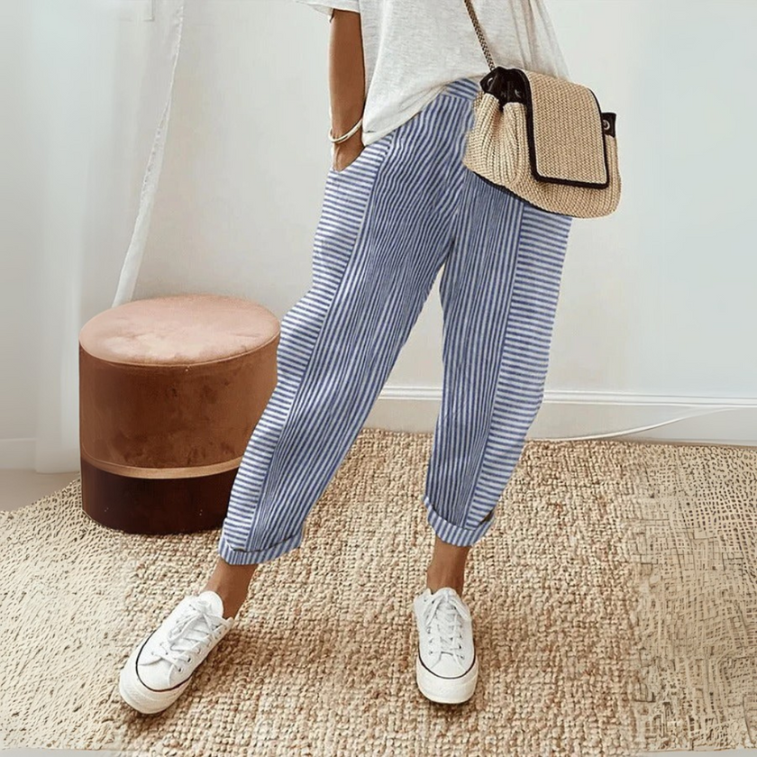 FJØRNA lightweight summer women's wide-leg trousers with striped pattern, breathable fabric and practical pockets.