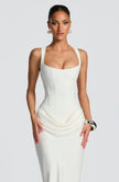 FJØRNA women's ivory summer maxi dress with square neckline and bodycon fit, flowing fabric, and sleeveless design.