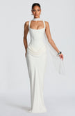 Ivory summer maxi dress for women by FJØRNA featuring a square neck and bodycon fit, displayed on a hanger.