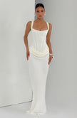 Women’s ivory summer maxi dress by FJØRNA with square neckline and fitted bodycon style, showcased on a model.