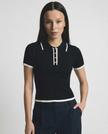 FJØRNA women's cotton polo top, short-sleeve casual blouse with collar and buttons, in soft fabric, on a white background.