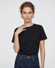 Women’s cotton T-shirt by FJØRNA, casual top with short sleeves and a soft, breathable fabric, shown in a neutral color.