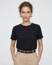 Women’s white cotton T-shirt by FJØRNA, casual top with short sleeves and a comfortable fit, displayed on a plain background.