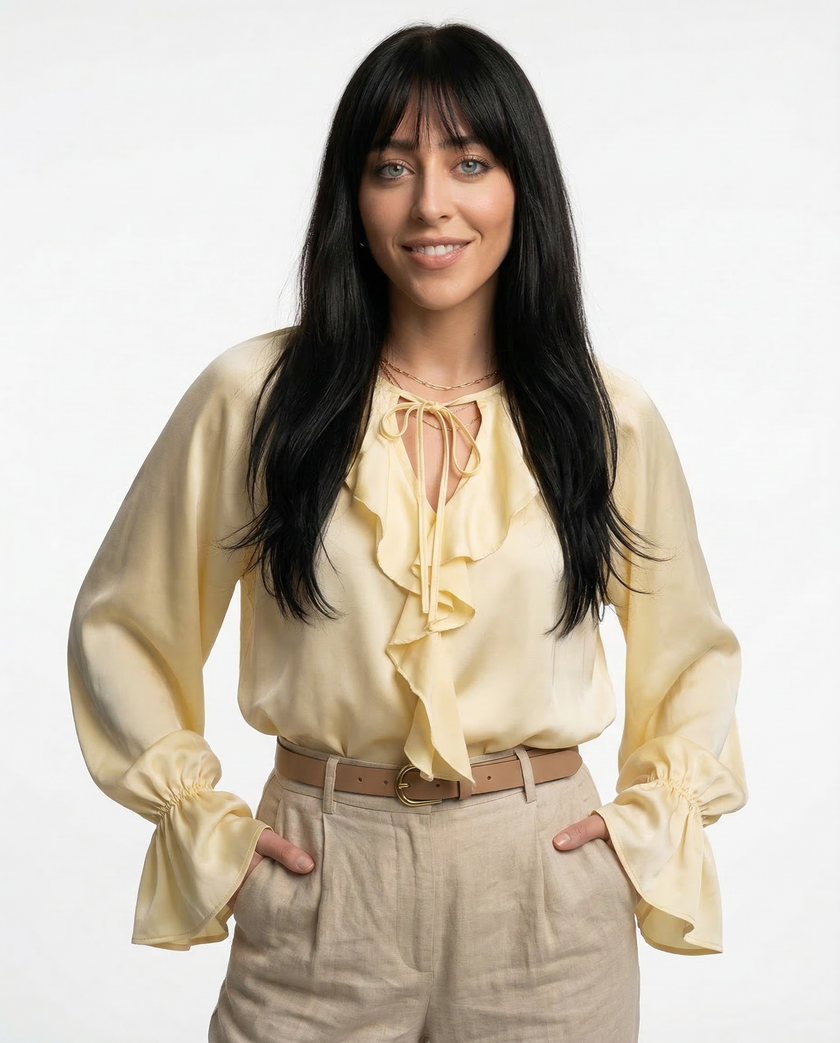 FJØRNA satin women's blouse with ruffle detail, elegant top featuring silky fabric and stylish design.