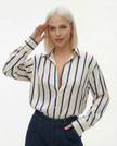FJØRNA satin blouse for women, stylish women's top with smooth fabric and elegant design, suitable for casual or formal wear.