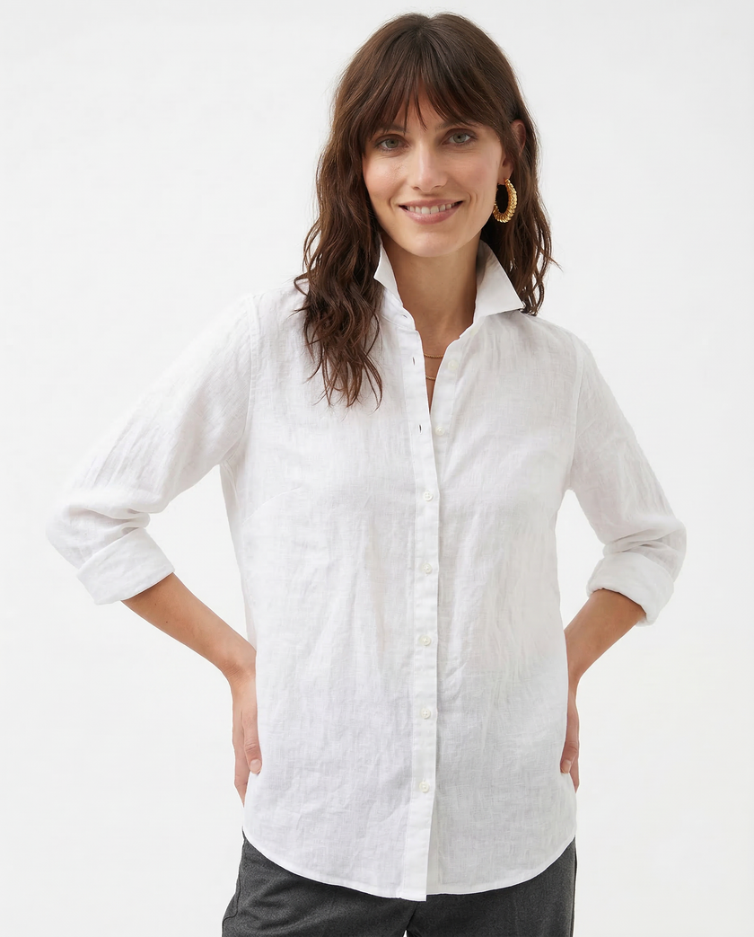 Light beige linen blouse for women by FJØRNA featuring long sleeves and a relaxed fit, perfect for casual and stylish wear.