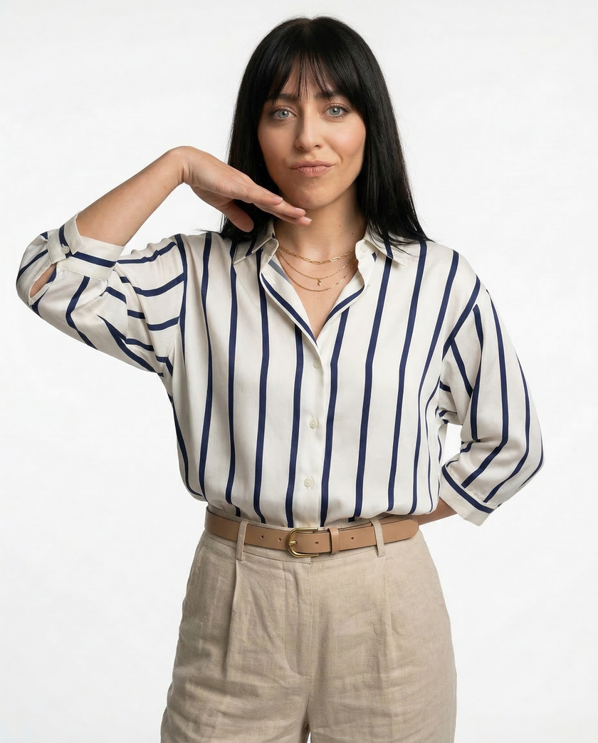 Lacceti Maren Stripe Satin Blouse featuring a stylish striped design and smooth satin fabric, shown on a hanger.