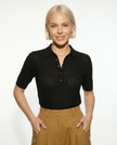 FJØRNA women's ribbed knit polo blouse featuring a classic collar and long sleeves, stylish and comfortable top for casual wear.