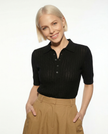 FJØRNA ribbed knit polo blouse for women, featuring a fitted design and classic collar, perfect for casual or office wear.