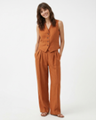 FJØRNA linen wide-leg women's trousers, part of co-ord set, featuring relaxed fit and lightweight fabric for casual style.