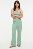 FJØRNA knit wide-leg women's trousers from co-ord set, showing soft, textured fabric and relaxed fit design.