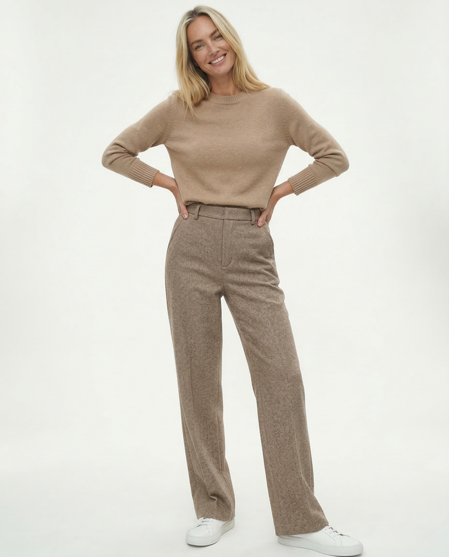 FJØRNA wool blend trousers for women, stylish pants with a tailored fit, shown in a versatile neutral color.