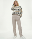 FJØRNA wool blend trousers for women, stylish pants with a tailored fit, in a versatile neutral color, displayed on a model.