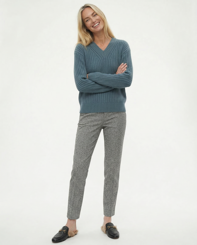 FJØRNA women's wool blend trousers, stylish pants featuring a tailored fit and classic design, shown in a neutral color.