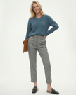 FJØRNA wool blend trousers for women, stylish pants with a tailored fit, shown in a neutral color on a model.