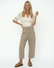 Women’s wide-leg denim jeans by FJØRNA, featuring classic style and relaxed fit, shown in a natural pose.
