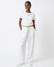 FJØRNA women's linen tapered trousers, lightweight and stylish pants, displayed on a neutral background.