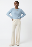FJØRNA women's merino wool wide-leg jogger pants, soft and comfortable for casual wear, shown in neutral fabric with relaxed fit.