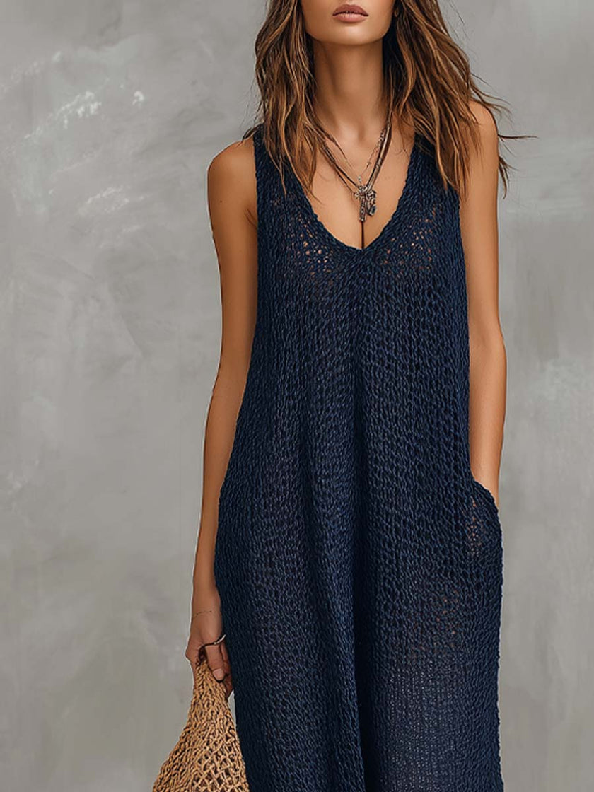Navy boho knitted sleeveless jumpsuit for women by FJØRNA, featuring a relaxed fit and stylish design.
