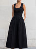 FJØRNA black sleeveless square-neck midi dress for women, showcasing a sleek, fitted design with a midi length and modern square neckline.
