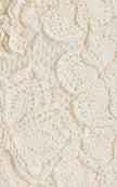FJØRNA Kendria floral crochet mini dress with intricate floral pattern, short sleeves, and fitted silhouette.