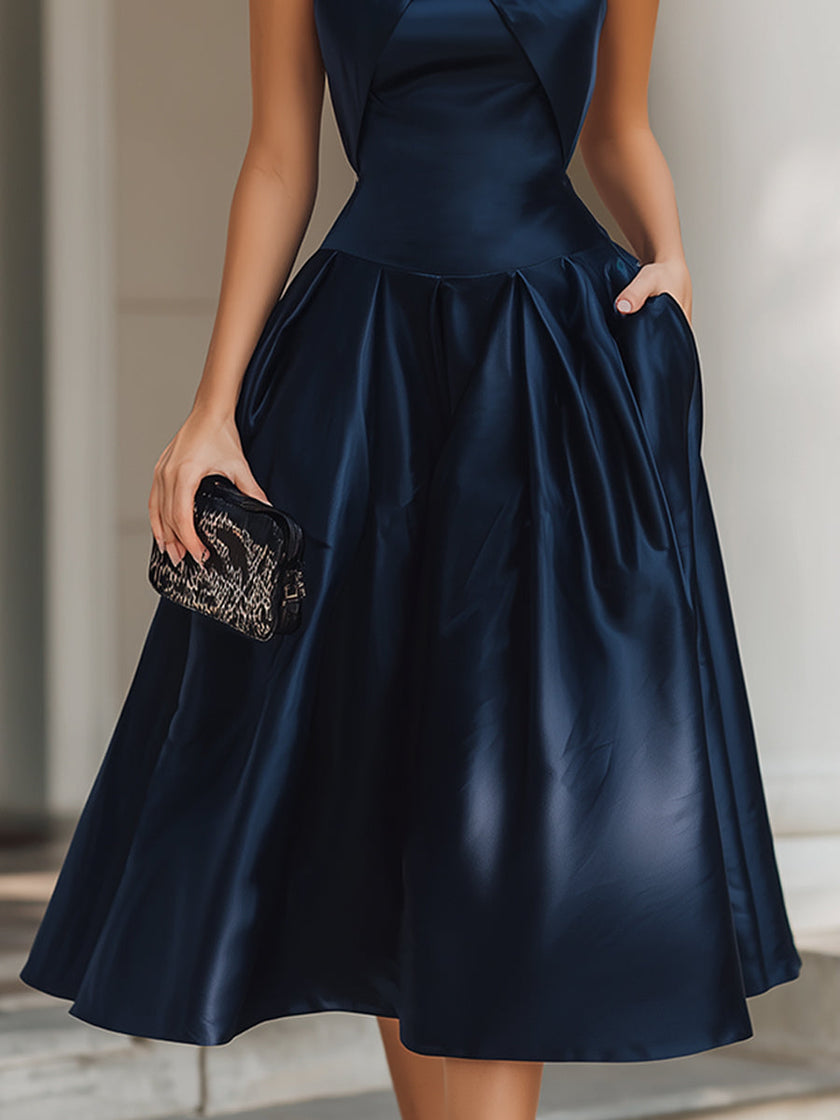 FJØRNA Cross-Halter Pleated Midi Dress for women, showcasing a stylish midi dress with pleated design and cross-halter neckline.