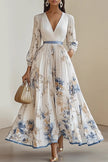 FJØRNA printed V-neck long sleeve maxi dress with bow tie waist, perfect for holiday occasions, featuring a stylish and elegant design.