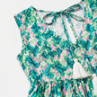 FJØRNA women's sleeveless floral print tie neck boho maxi dress displayed on a model, perfect for summer or casual wear.