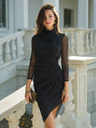 FJØRNA ruched mock neck sheath dress with sheer sleeves, midi length, elegant women's dress displayed on a hanger.