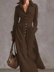 FJØRNA high waisted long sleeves maxi dress with pleated pockets, split-joint lapel, solid color, and button details.