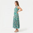 Women's sleeveless floral print boho maxi dress by FJØRNA with tie neck and flowy silhouette, perfect for summer or casual wear.