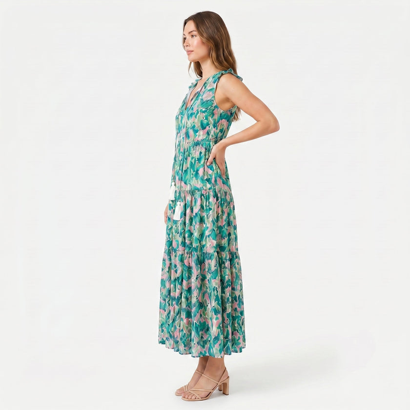 Women's sleeveless floral print boho maxi dress by FJØRNA with tie neck and flowy silhouette, perfect for summer or casual wear.