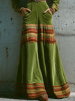 FJØRNA boho olive green velvet maxi dress with striped hem, flowing sleeveless design, perfect for casual and bohemian styles.