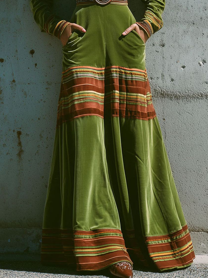 FJØRNA boho olive green velvet maxi dress with striped hem, flowing sleeveless design, perfect for casual and bohemian styles.